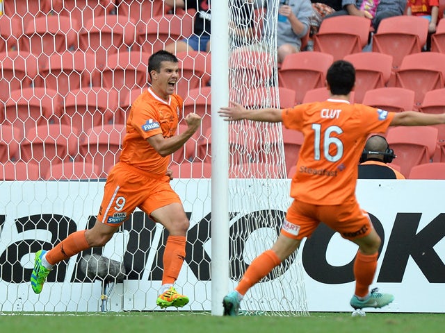 Andrija Kaluderovic of the Roar celebrates after scoring a goal during the round 22 A-League match between the Brisbane Roar and the Wellington Phoenix at Suncorp Stadium on March 22, 2015