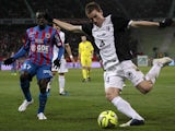 Caen's French midfielder N'golo Kante vies for the ball with Metz's French defender Gaetan Bussmann during the French L1 football match between Caen and Metz on March 21, 2015