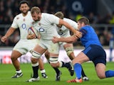 England captain Chris Robshaw is tugged during the final Six Nations game against France on March 21, 2015