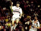 Denis Irwin of Manchester United celebrates his goal with team mate Roy Keane during the FA Carling Premiership match against Liverpool played at Anfield on May 5, 1999