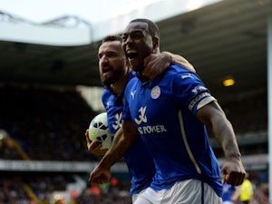 Wes Morgan of Leicester City celebrates after scoring his team's second goal during the Barclays Premier League match between Tottenham Hotspur and Leicester City at White Hart Lane on March 21, 2015