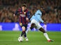 Lionel Messi of Barcelona is challenged by Yaya Toure of Manchester City during the UEFA Champions League Round of 16 second leg match on March 18, 2015