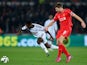 Liverpool player Steven Gerrard challenges Nathan Dyer of Swansea during the Barclays Premiership match between Swansea City and Liverpool at Liberty Stadium on March 16, 2015