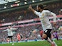 Manchester United's Spanish midfielder Juan Mata celebrates after scoring the opening goal of the English Premier League football match between Liverpool and Manchester United at Anfield in Liverpool, north west England on March 22, 2015