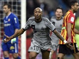 Marseille's Ghanaian forward Andre Ayew celebrates after scoring a goal during the French L1 football match between Lens and Marseille on March 22, 2014