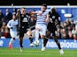Mauricio Isla of QPR is challenged by Leon Osman (L) and Arouna Kone of Everton during the Barclays Premier League match on March 22, 2015