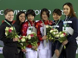 Meaghan Benfeito, Roseline Filion, Huixia Liu, Ruolion Chen, Jun Hoong and Cheong Mun Yee Leong pose with their medals after the women's 10m synchro on March 19, 2015
