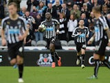 Newcastle United's French midfielder Moussa Sissoko runs back with the ball after scoring his team's first goal in the English Premier League football match between Newcastle and Arsenal at St James Park, Newcastle-Upon-Tyne, north east England on March 2
