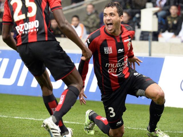 Nice's Brazilian midfielder Carlos Eduardo celebrates after scoring a goal during the French L1 football match between Lyon and Nice on March 21, 2015