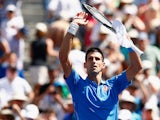 Novak Djokovic of Serbia celebrates defeating Andy Murray of Great Britain during day thirteen of the BNP Paribas Open tennis at the Indian Wells Tennis Garden on March 21, 2015