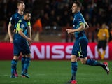 Arsenal's French striker Olivier Giroud celebrates after scoring a goal during the UEFA Champions League football match Monaco vs Arsenal, on March 17, 2015
