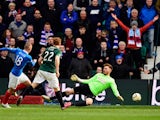 Rangers forward Kenny Miller slots the ball past Hibs goalkeeper Mark Oxley for the second goal during the Scottish Championship match between Hibernian and Rangers at Easter Road on March 22, 2015