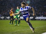 Jamie Mackie of Reading celebrates scoring his team's third goal during the FA Cup Quarter Final Replay match between Reading and Bradford City at Madejski Stadium on March 16, 2015