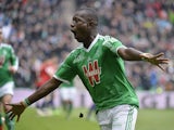 Saint-Etienne's Ivorian forward Max-Alain Gradel celebrates after opening the scoring during the French L1 football match Saint-Etienne (ASSE) vs Lille (LOSC) on March 22, 2015