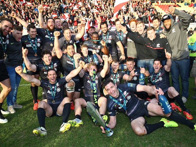 Saracens celebrate with the trophy after a last minute victory over Exeter in the LV= Cup Final on March 22, 2015