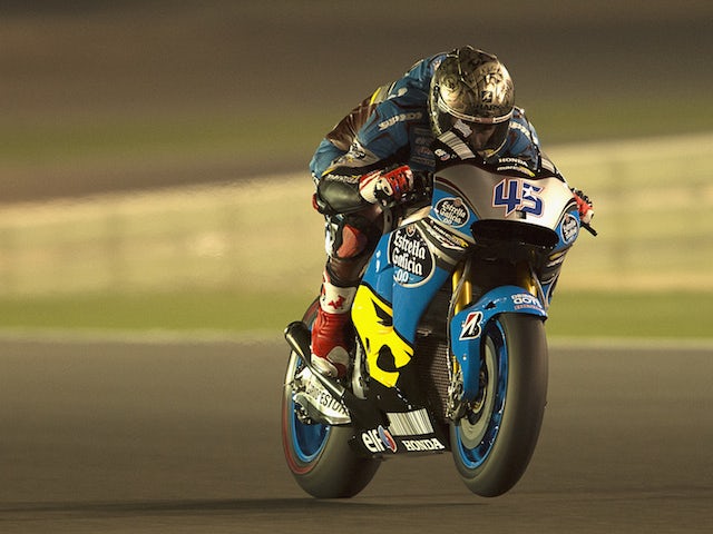 Scott Redding of Great Britain and Estrella Galicia 0,0 Marc VDS heads down a straight during the MotoGP Tests in Qatar - Day One at Losail Circuit on March 14, 2015