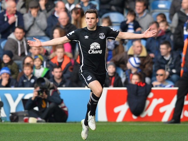 Everton's Irish defender Seamus Coleman celebrates scoring the opening goal during the English Premier League football match against Queens Park Rangers on March 22, 2015