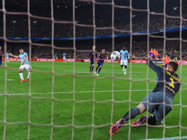 Sergio Aguero of Manchester City sees his penalty saved by Marc-Andre ter Stegen of Barcelona during the UEFA Champions League Round of 16 second leg match on March 18, 2015