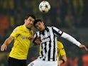 Dortmund's Greek defender Sokratis (L) and Juventus' Spanish forward Alvaro Morata vie for the ball during the Round of 16, second-leg UEFA Champions League football match  on March 18, 2015