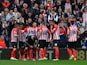Southampton players celebrate after Jason Shackell of Burnley scored an own goal during the Barclays Premier League match between Southampton and Burnley at St Mary's Stadium on March 21, 2015