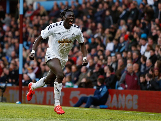 Bafetibis Gomis of Swansea City celebrates scoring the winning goal during the Barclays Premier League match between Aston Villa and Swansea City at Villa Park on March 21, 2015