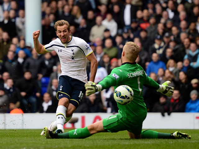 Harry Kane of Spurs shoots at goal past Kasper Schmeichel of Leicester City during the Barclays Premier League match between Tottenham Hotspur and Leicester City at White Hart Lane on March 21, 2015