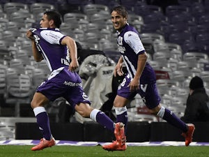 Toulouse's French Tunisian forward Wissam Ben Yedder celebrates after scoring a goal during the French L1 football match between Toulouse and Bordeaux March 21, 2015