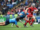 Jonathan Davies of Wales breaks past Leonardo Ghiraldini and Martin Castrogiovanni of Italy during the RBS 6 Nations match between Italy and Wales at Stadio Olimpico on March 21, 2015