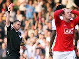 Manchester United's Wayne Rooney is sent off by referee Phil Dowd for receiving a second yellow card during the Premier League football match between Fulham and Manchester United at Craven Cottage in London, on March 21, 2009