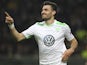 Daniel Caligiuri of VfL Wolfsburg celebrates after scoring the opening goal during the UEFA Europa League Round of 16 match between FC Internazionale Milano and VfL Wolfsburg at Stadio Giuseppe Meazza on March 19, 2015