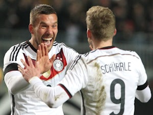 Podolski downs England on international farewell