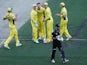 James Faulkner of Australia lets Grant Elliot of New Zealand know he took his wicket during the 2015 ICC Cricket World Cup final match between Australia and New Zealand at Melbourne Cricket Ground on March 29, 2015