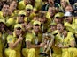 Australia's captain Michael Clarke (C) lifts the winning trophy of 2015 Cricket World Cup after beating New Zealand in the final in Melbourne on March 29, 2015