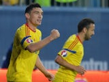 Claudiu Keseru (L) of Romania celebrates after he scored 1-0 against Faroe Islands during the UEFA Euro 2016 qualifying football match during the Group F Euro 2016 qualifying football match between Romania and Faroe Islands, on March 29, 2015