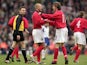 David Beckham (left) celebrates with Steve McManaman (right) of England after the World Cup 2002 Group 9 Qualifying match against Finland at Anfield on March 24, 2001