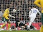 England's striker Wayne Rooney scores his team's first goal during a Euro 2016 Group E qualifying football match between England and Lithuania at Wembley Stadium in north London on March 27, 2015