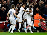 Wayne Rooney of England celebrates the first goal with his team mates during the EURO 2016 Qualifier match between England and Lithuania at Wembley Stadium on March 27, 2015
