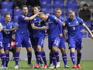 Iceland go top with comeback win
