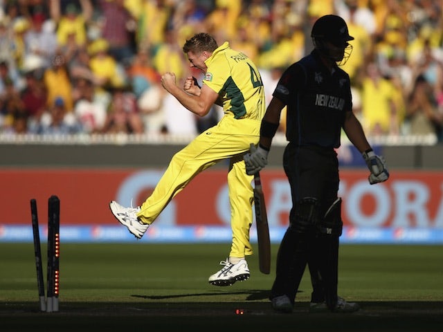 James Faulkner of Australia celebrates after taking the wicket of Corey Anderson of New Zealand during the 2015 ICC Cricket World Cup final at Melbourne Cricket Ground on March 29, 2015