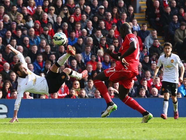 Juan Mata of Manchester United scores his second goal during the Barclays Premier League match against Liverpool at Anfield on March 22, 2015