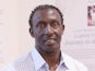 Former sprinter Linford Christie poses for a photograph at his 'Journey to the Podium' exhibition at the Getty Images Gallery Westfield on August 9, 2012