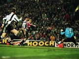 Stan Collymore of Liverpool scores a dramatic last minute winning goal during the FA Carling Premiership match between Liverpool and Newcastle United played at Anfield on April 3, 1996