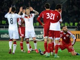 Germany's midfielder Mesut Ozil and Germany's midfielder Marco Reus celebrate their team's second goal during the Euro 2016 qualifying football match between Georgia and Germany in Tbilisi on March 29, 2015