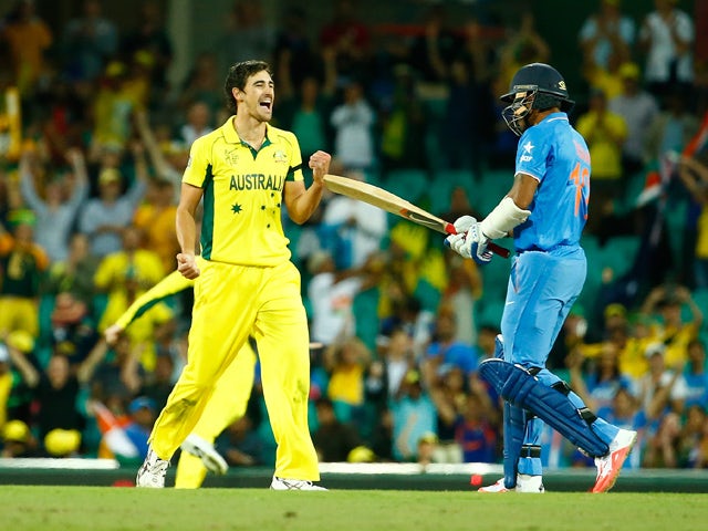Mitchell Starc of Australia celebrates taking the final wicket during the 2015 Cricket World Cup Semi Final match between Australia and India at Sydney Cricket Ground on March 26, 2015