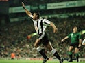 Les Ferdinand of Newcastle celebrates after scoring the equaliser against Liverpool during their FA Premiership game at Anfield on April 3, 1996