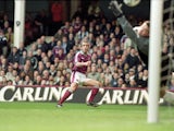 Paolo Di Canio scores the first goal for West Ham United during the FA Carling Premiership match against Wimbledon at Upton Park in London March 26, 2000