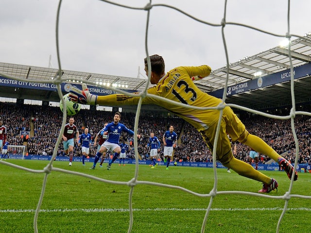 Adrian the Whest Ham United goalkeeper saves the penalty taken by David Nugent during the Barclays Premier League match between Leicester City and West Ham United at The King Power Stadium on April 4, 2015