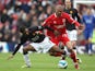 Afonso Alves of Middlesbrough is challenged by Patrice Evra of Manchester United during the Barclays Premier League match between Middlesbrough and Manchester United at the Riverside Stadium on April 6, 2008