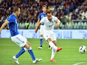 Townsend strike gives England draw in Italy
