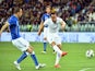 England's midfielder Andros Townsend (R) shoots to score a goal during the friendly football match Italy vs England at the Juventus Stadium in Turin on March 31, 2015